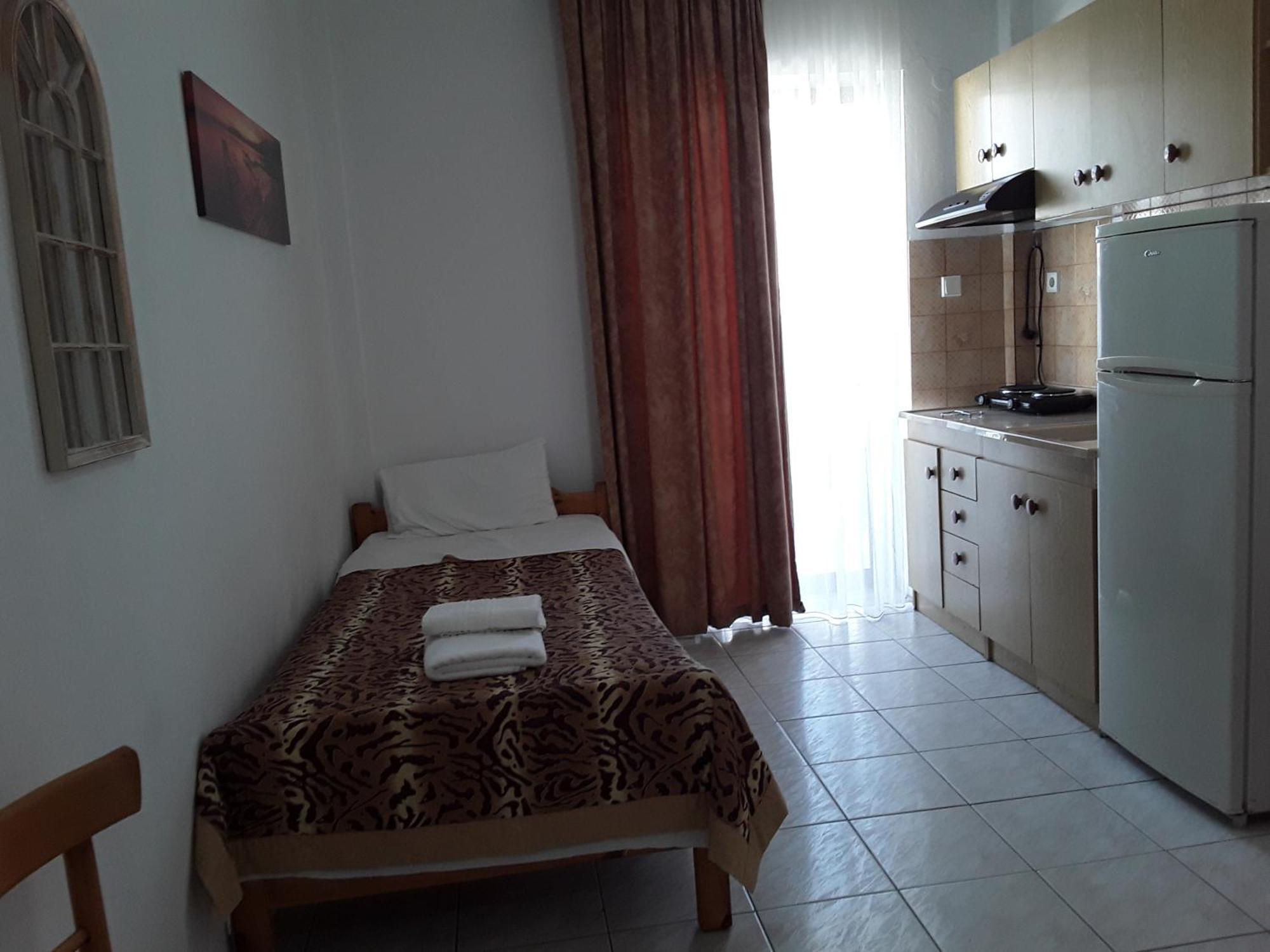 Aparthotel Hause Zorbas Paralia Dionisiou Habitación foto